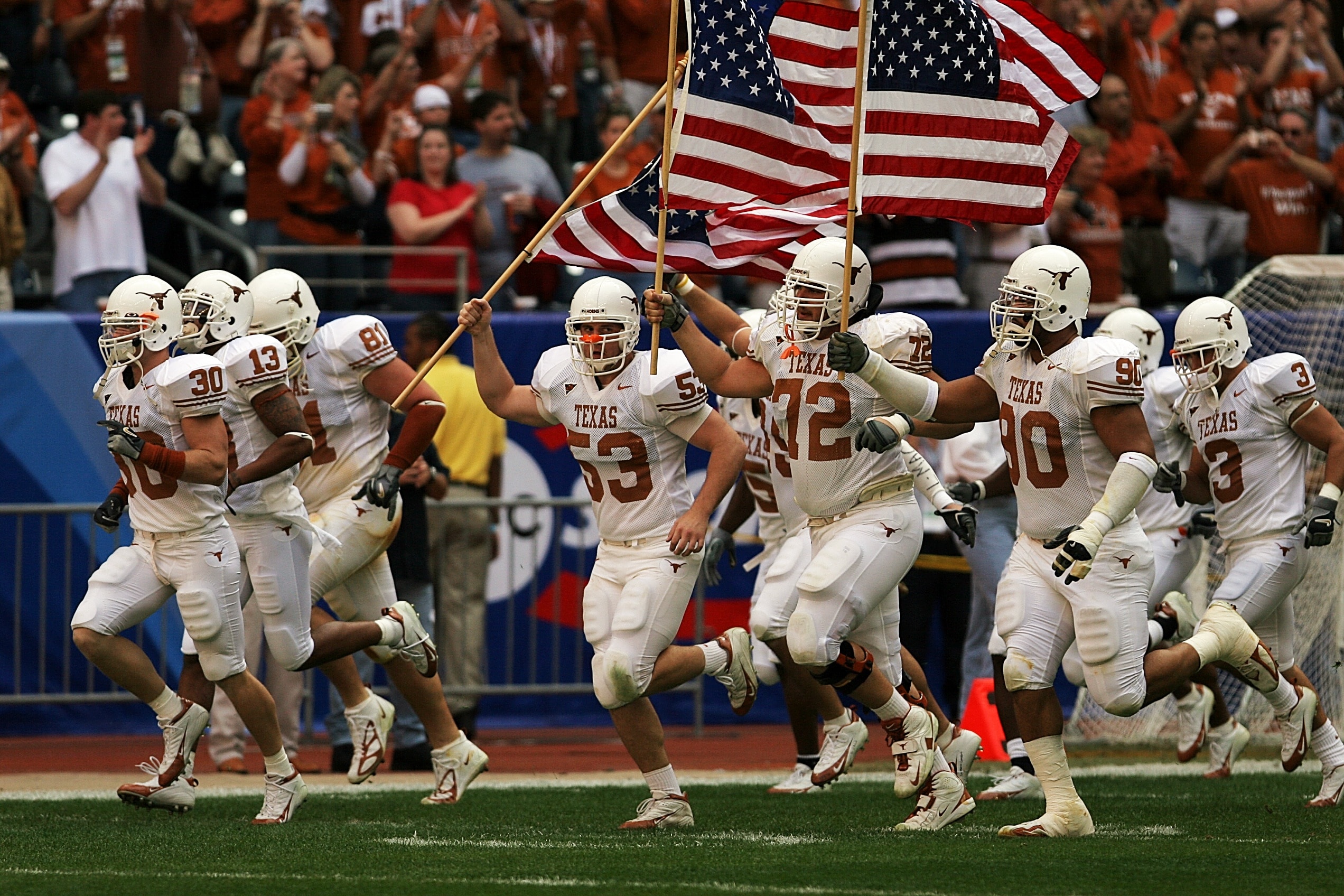 football in white jersey team running with american flag free image