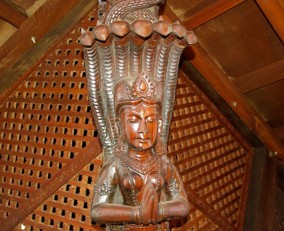 brown wooden deity god sculpture preview