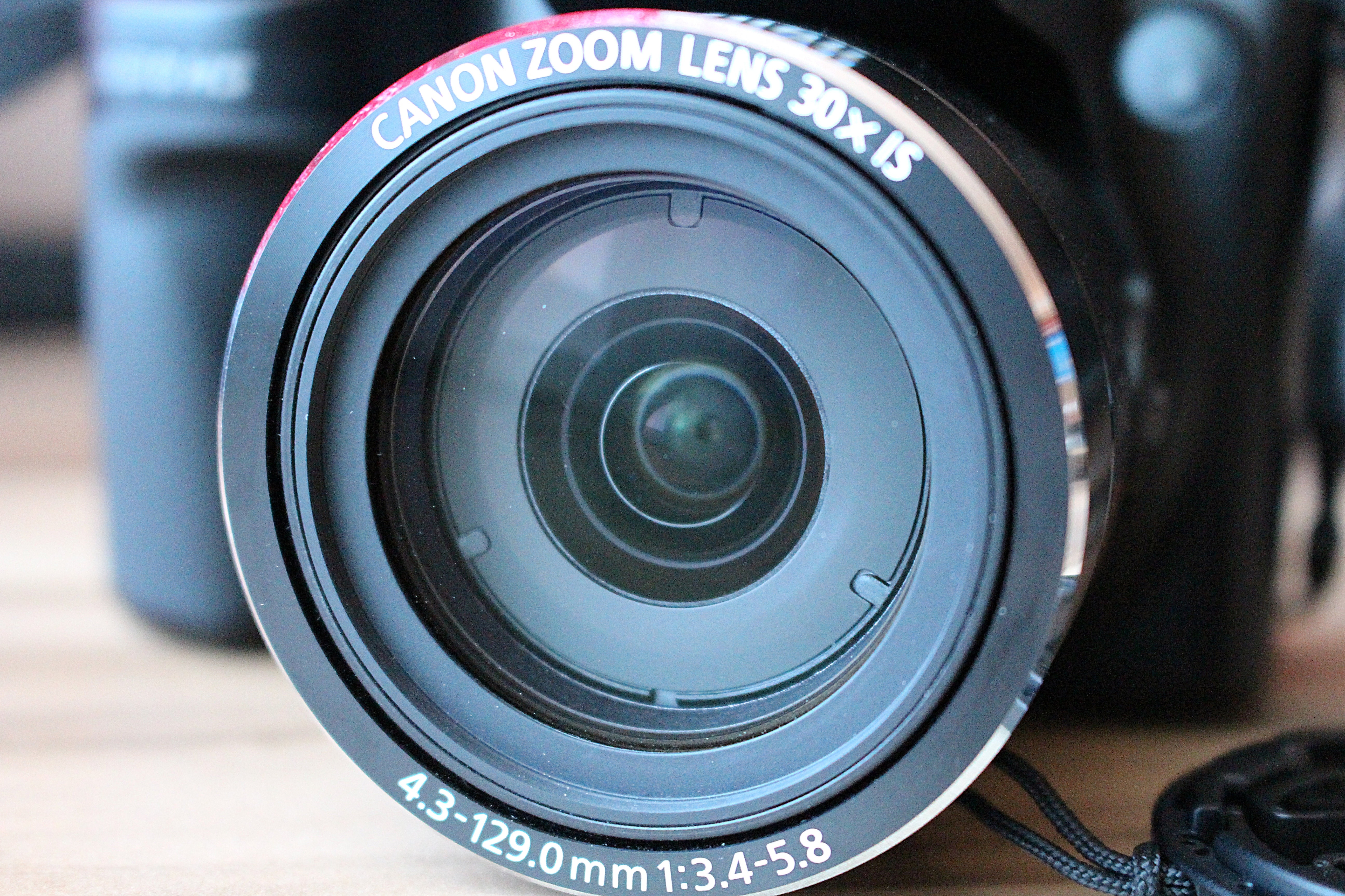 black canon lens 30x15
