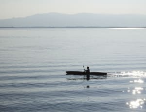 silhouette of person sailing on body types of water thumbnail