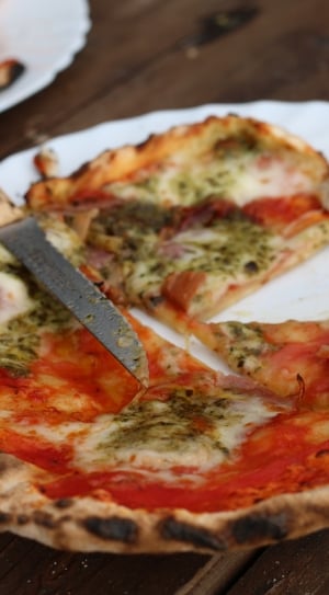 pizza slices on white plate thumbnail