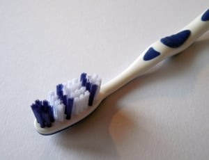 purple and white tooth brush thumbnail