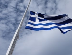 blue and white flag on the flagpole thumbnail