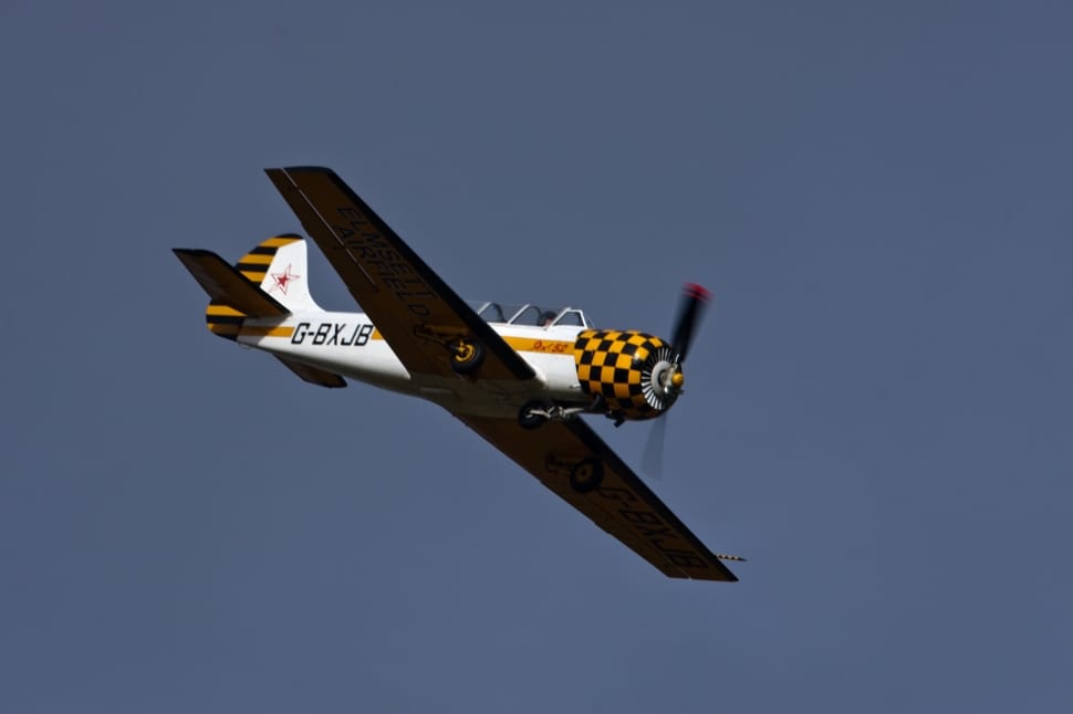 white yellow and black plane preview