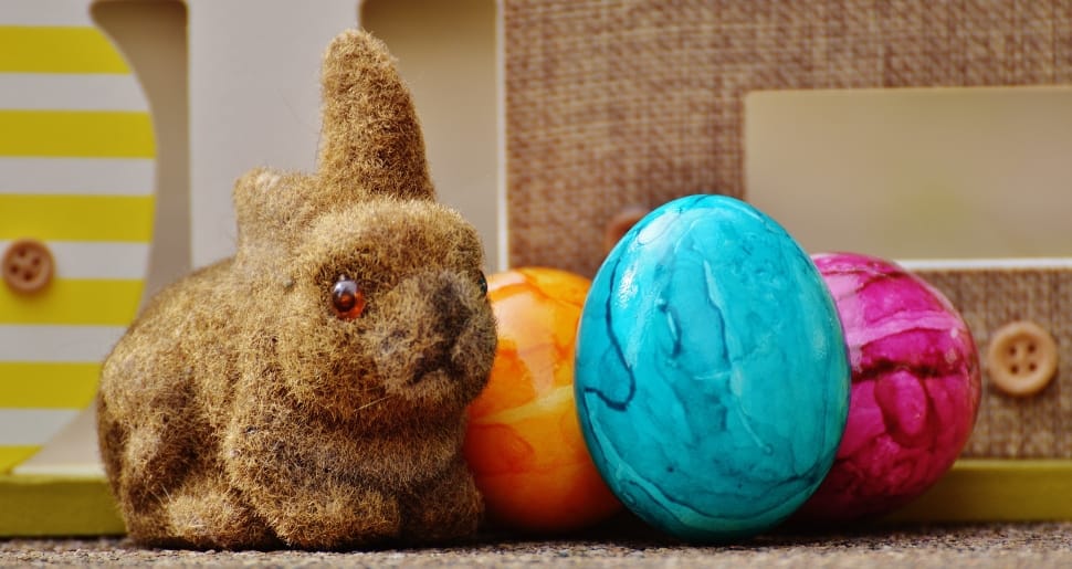 brown rabbit plush toy and three faberge eggs preview