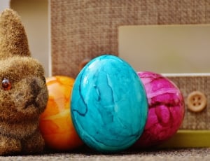 brown rabbit plush toy and three faberge eggs thumbnail
