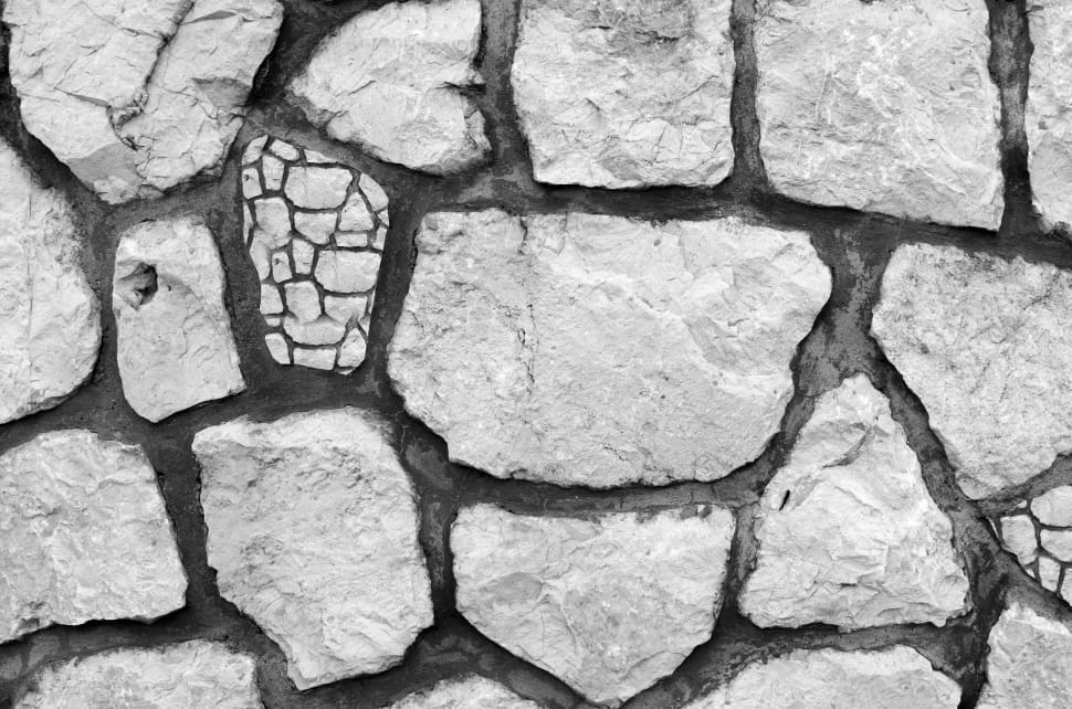 greyscale photo of grey concrete bricks preview