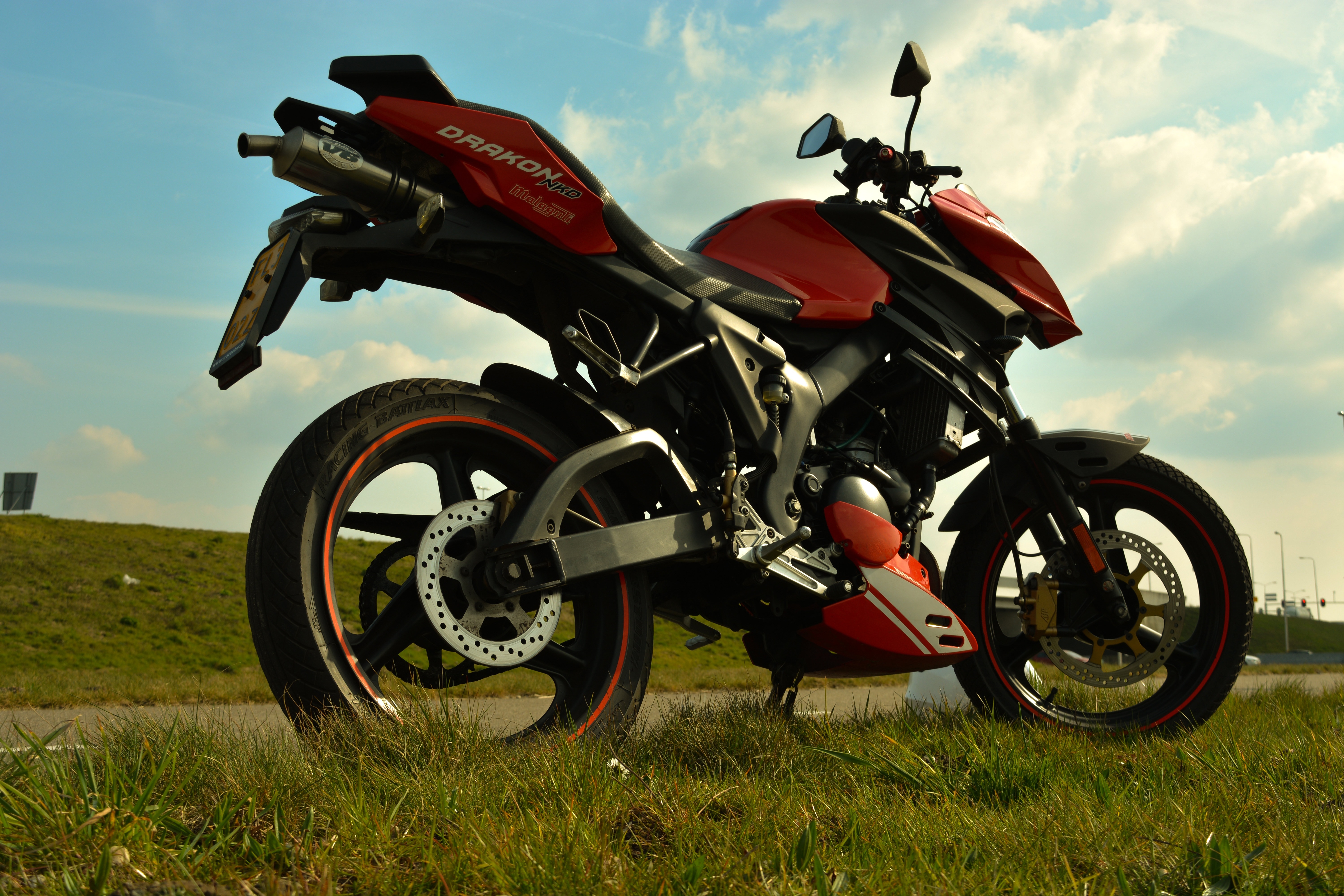 red and silver drakon sports bike