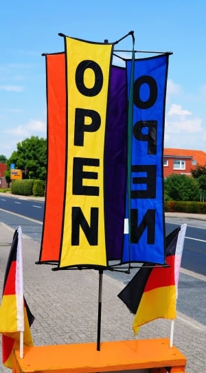 yellow blue and red open signage thumbnail