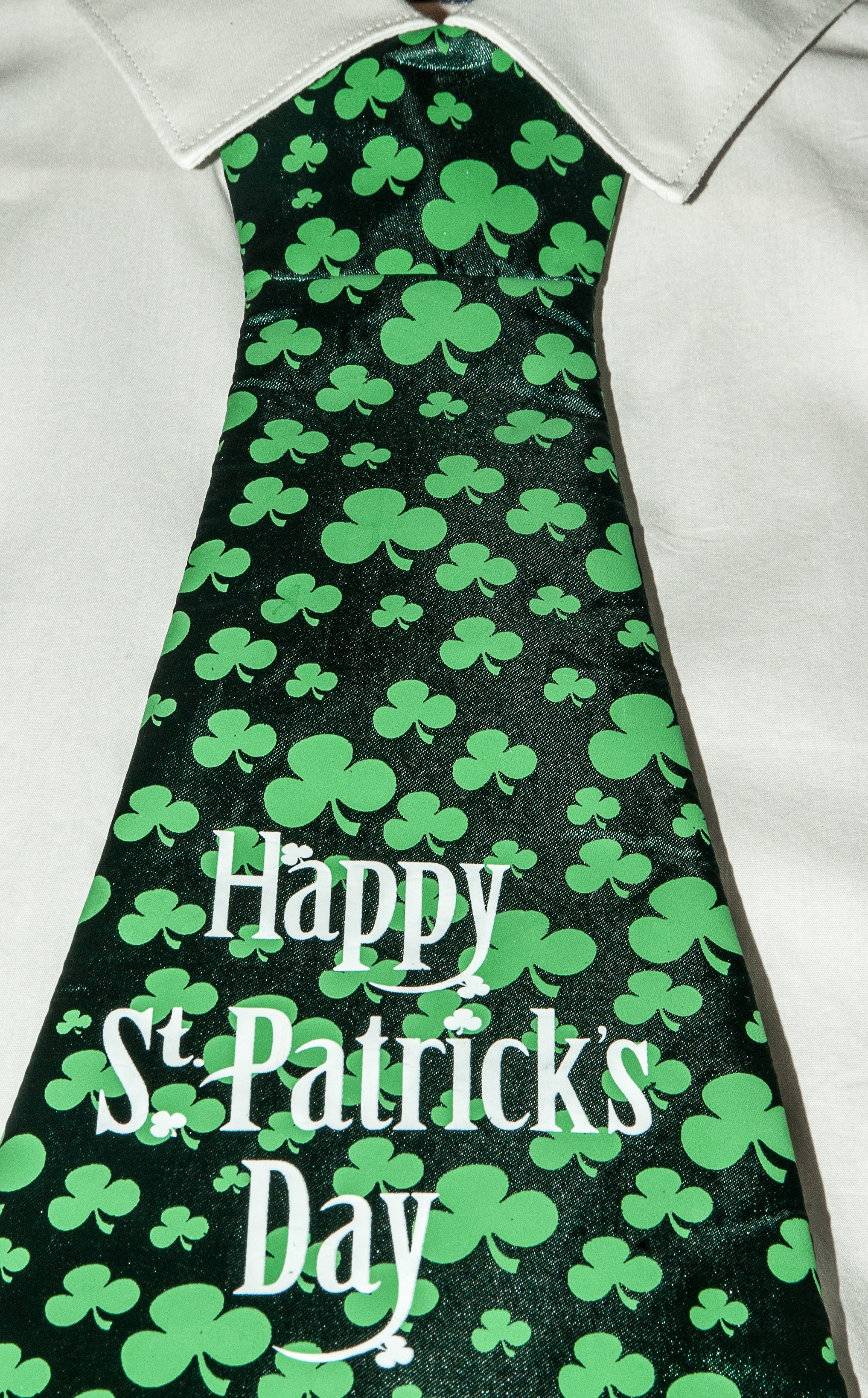 green and black happy st. patrick's day and clover leaf monogram print necktie