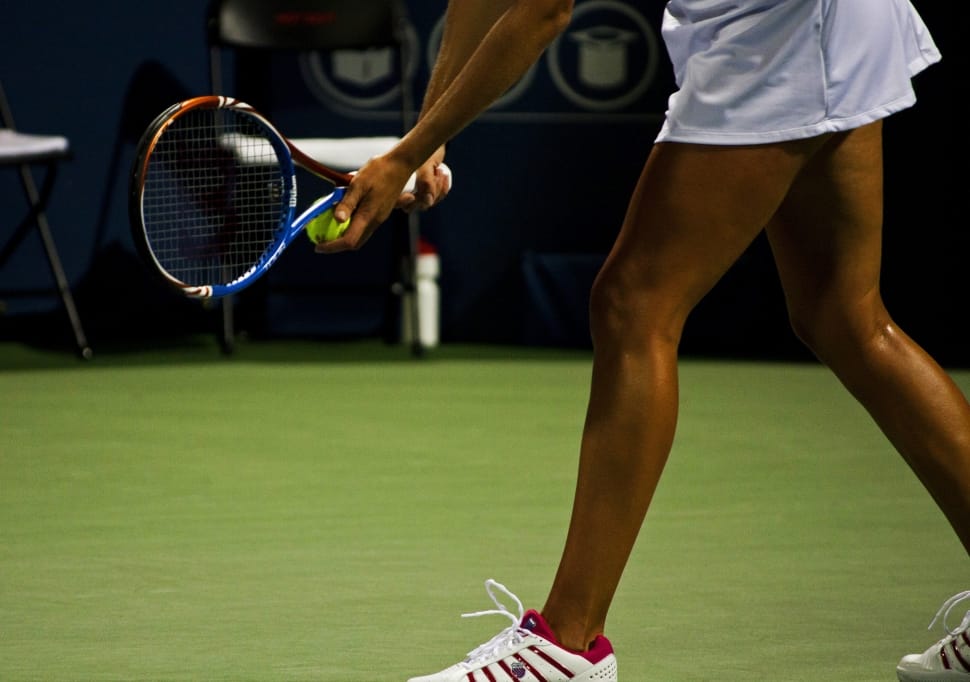 woman playing tennis preview