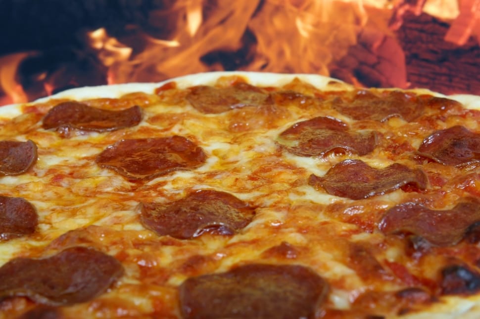 pizza topped with pepperoni slices preview