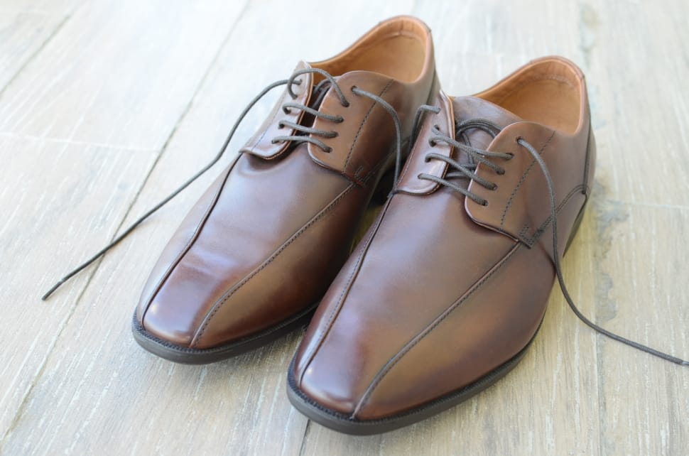 brown leather shoes on floor preview