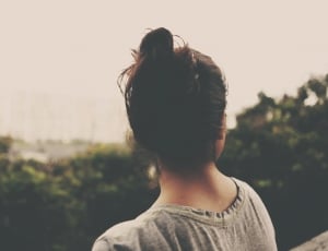photo of womens back wearing gray top during daytime thumbnail