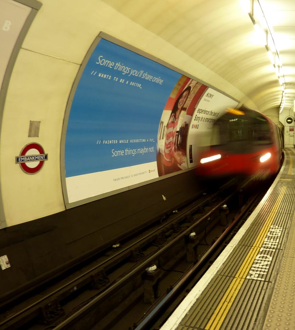 red and black subway train preview