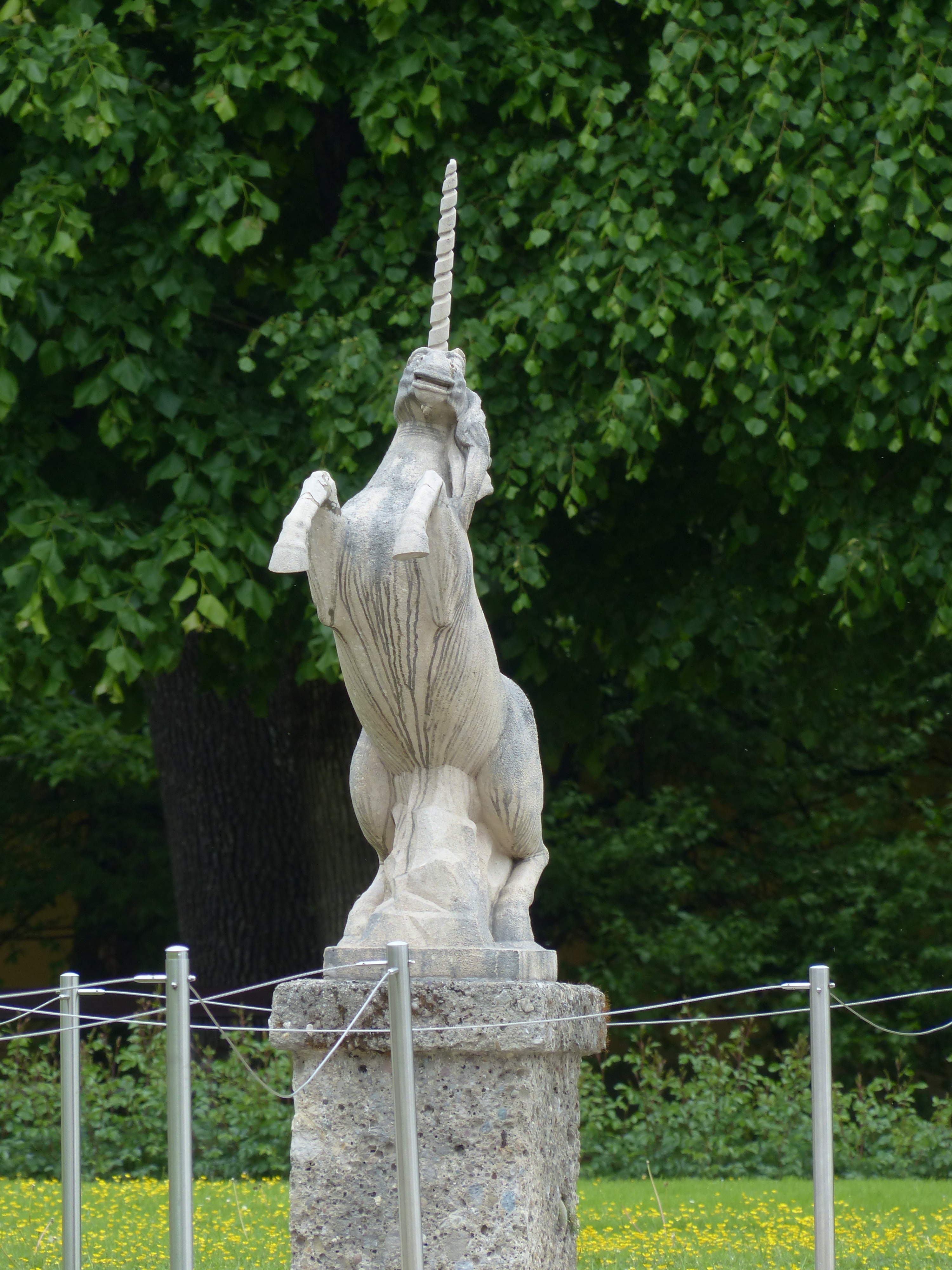 gray unicorn concrete statue