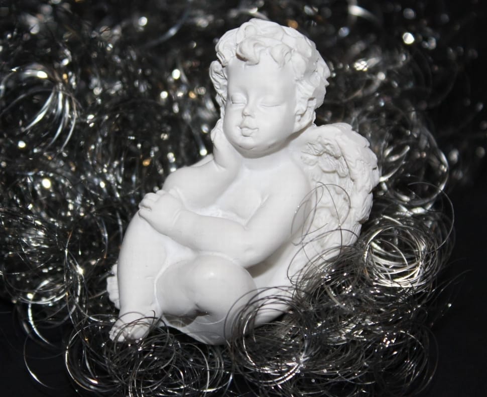 white cherub ceramic figurine preview