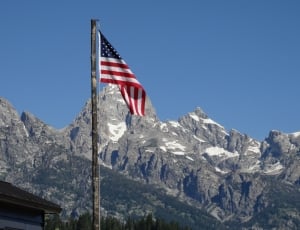 American flag during daytime thumbnail