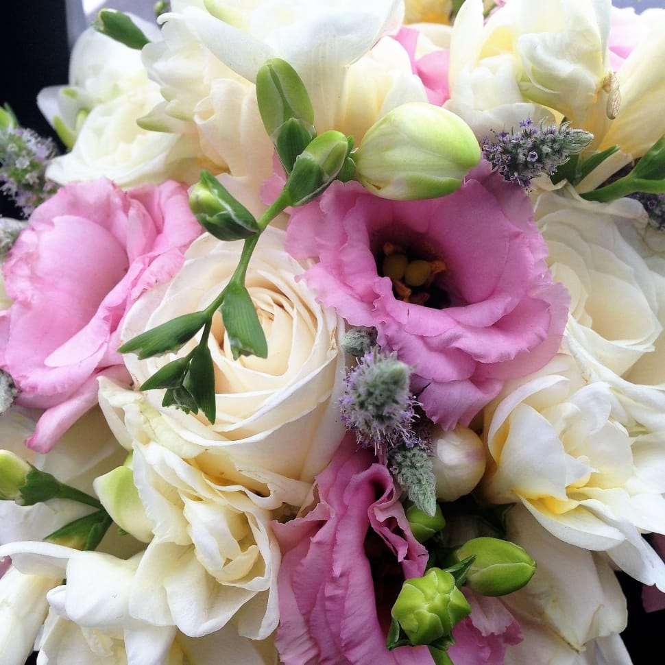 white roses and purple lisianthus arrangement preview