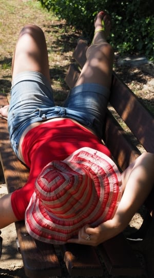women's red top and denim shorts with hat thumbnail