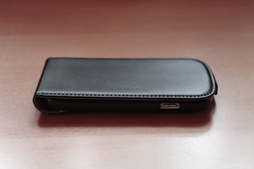black leather electronic device preview