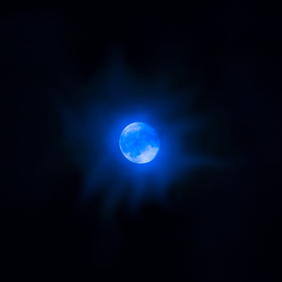 blue full moon in night sky preview