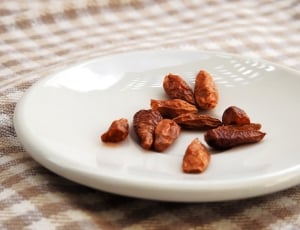 raisins on white ceramic plate thumbnail