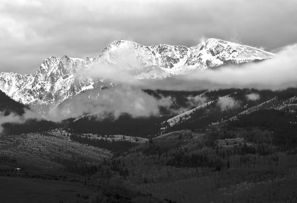 grayscale photograph of mountain alps with clouds preview