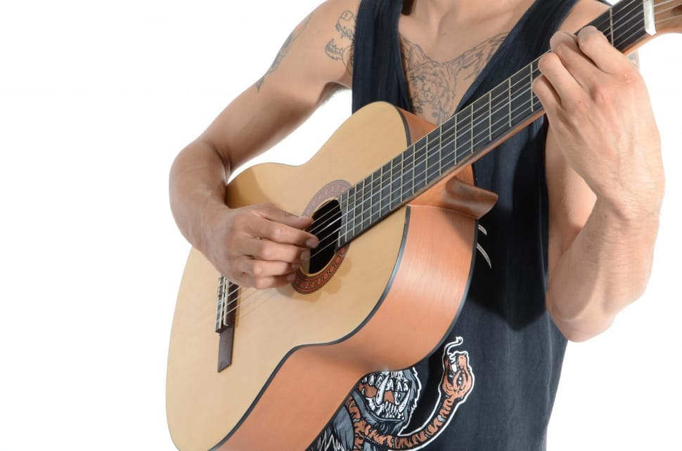 man playing a dreadnought acoustic guitar preview
