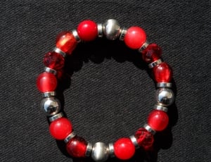red and silver beaded bracelet thumbnail