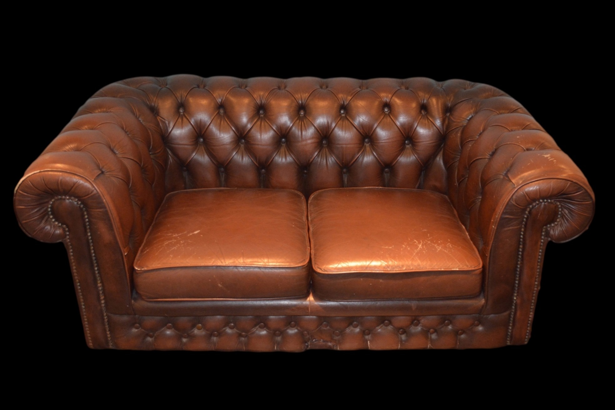 brown leather 2 cushion sofa