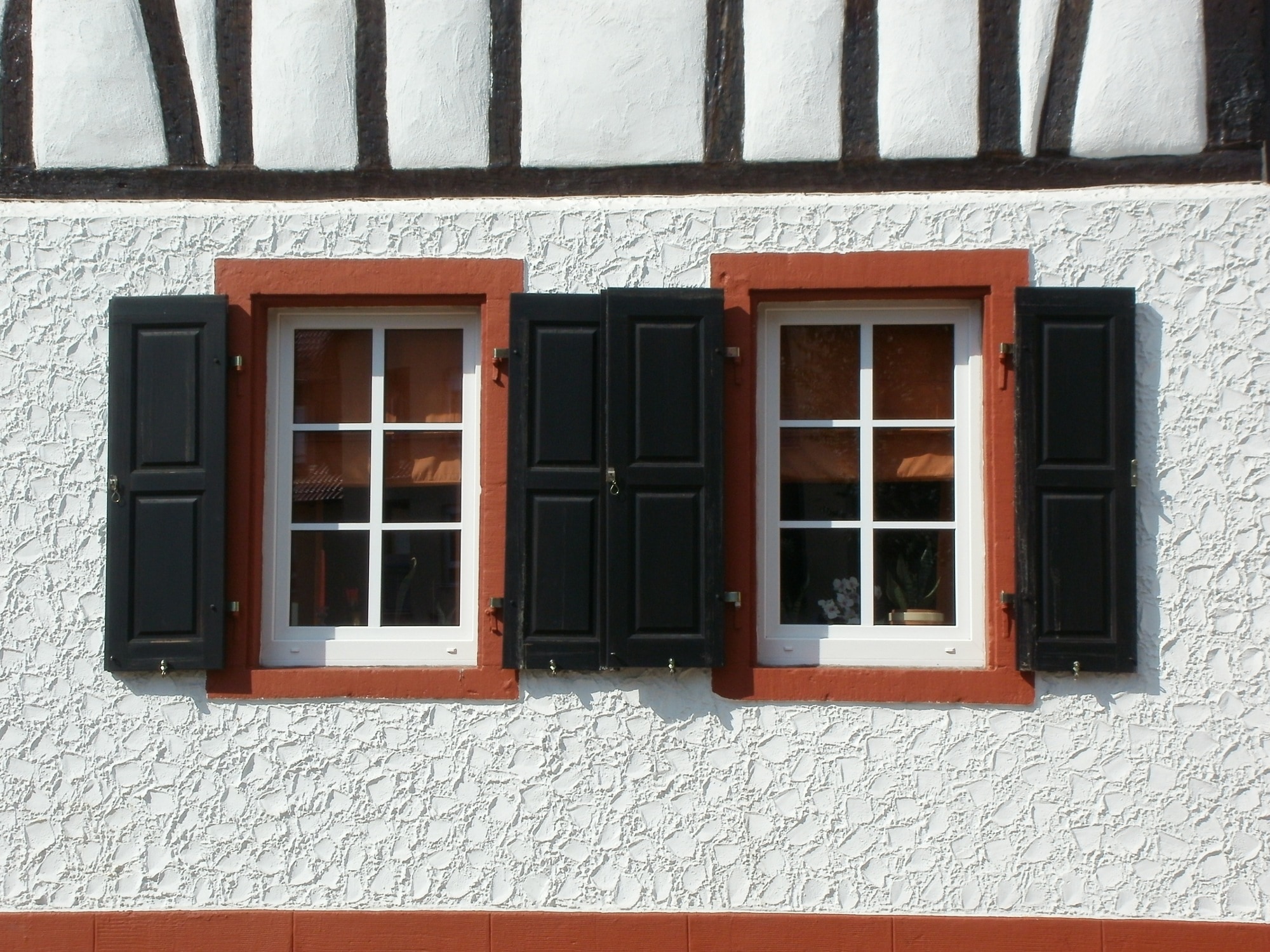 white wooden glass panel windows