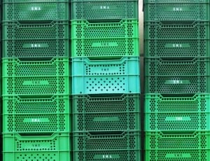 pile of green plastic crates thumbnail