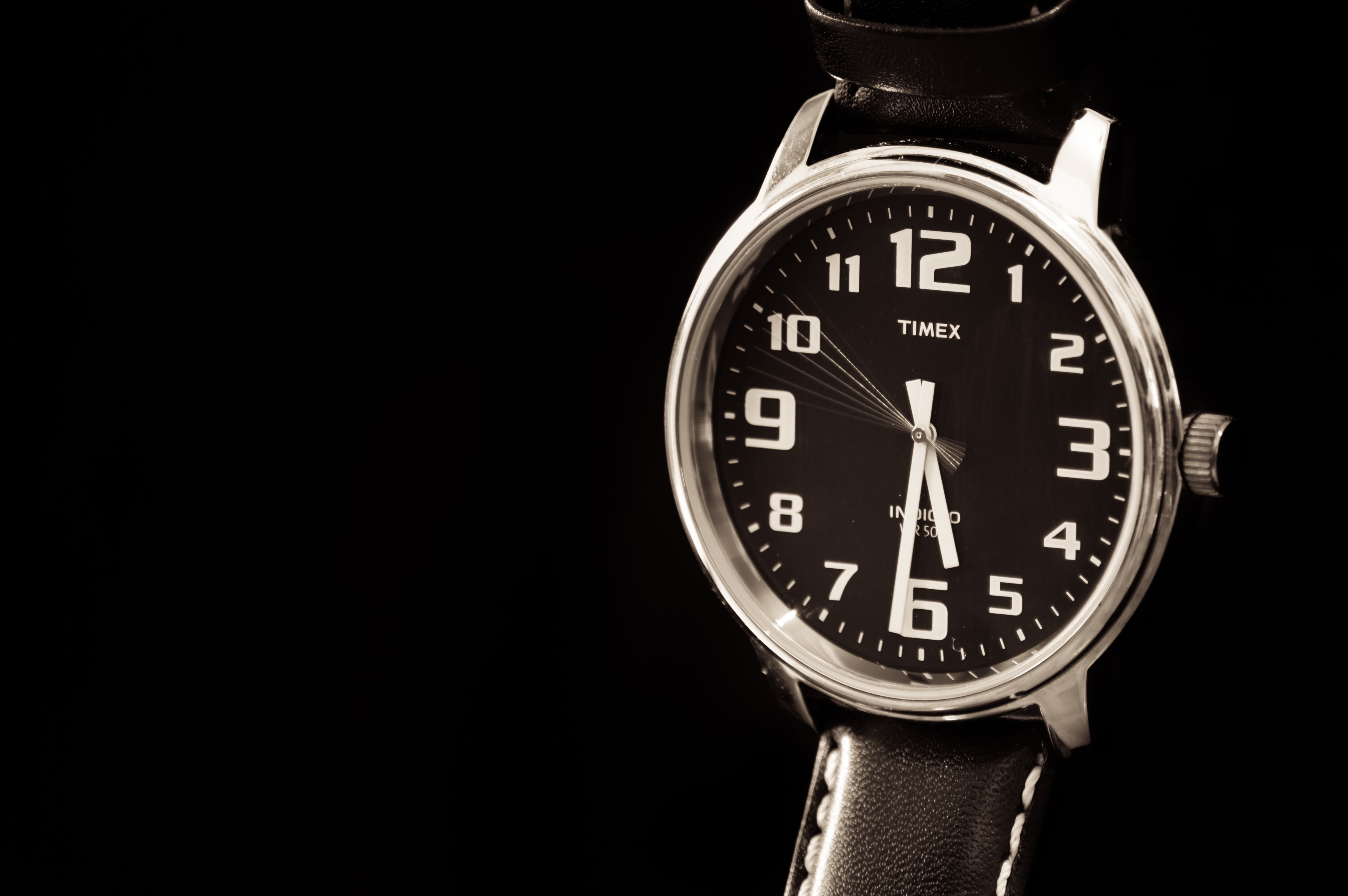 black strap silver round face timex analog watch