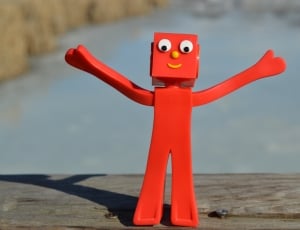 red plastic robot mini figure thumbnail