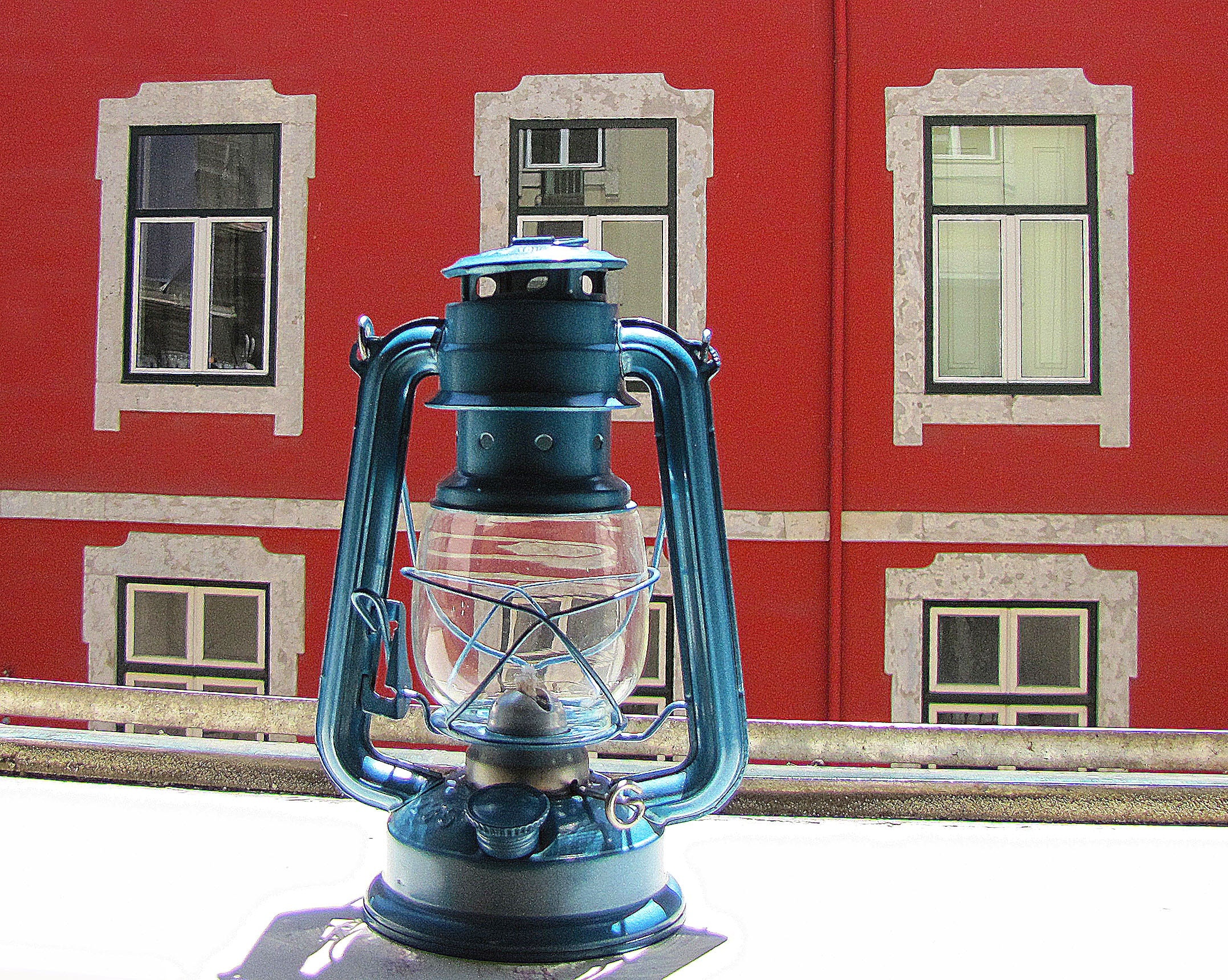 grey and clear glass kerosene lantern