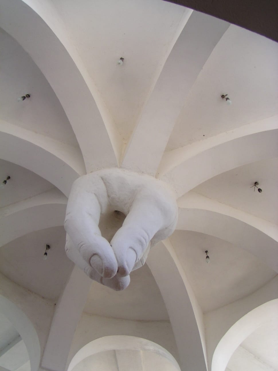 white concrete hand shape ceiling decor preview