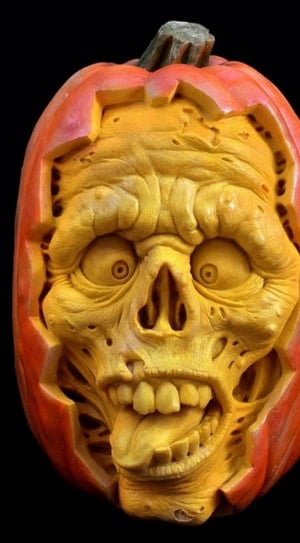 orange and beige pumpkin and skull themed decor thumbnail