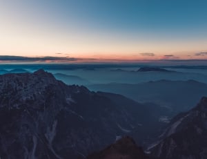 aerial photo of mountains during golden hour thumbnail