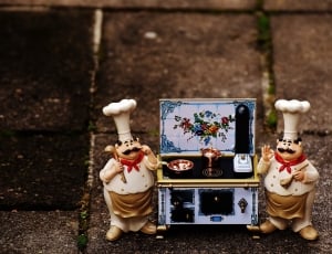 2 chef figurine standing near induction range oven toy thumbnail