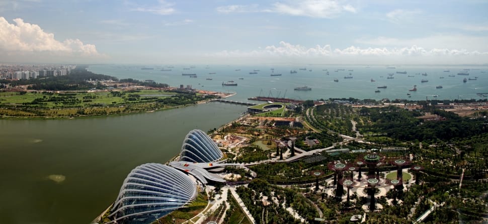 aerial photo of a city beside body of water during daytime preview