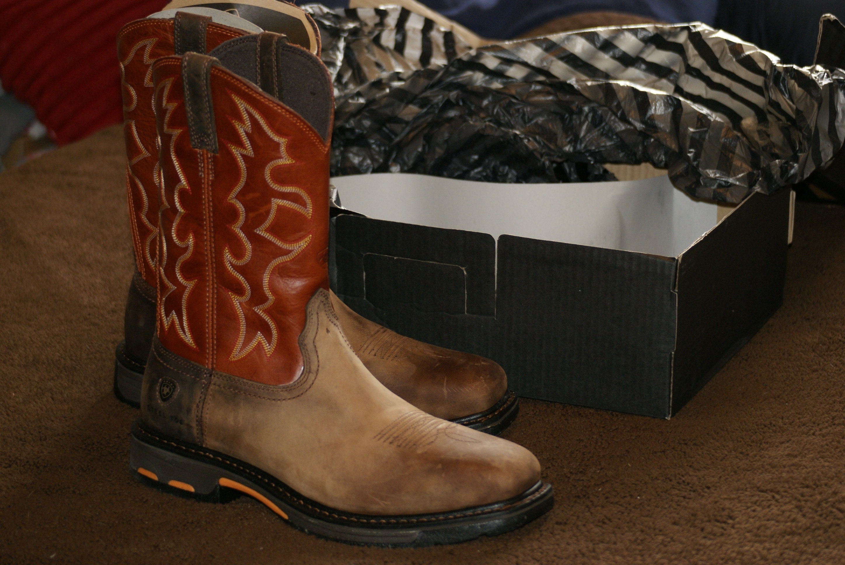 brown and red cowboy boots and box