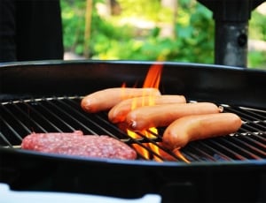 black steel framed charcoal grill thumbnail