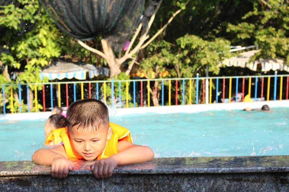 boy's yellow life vest preview