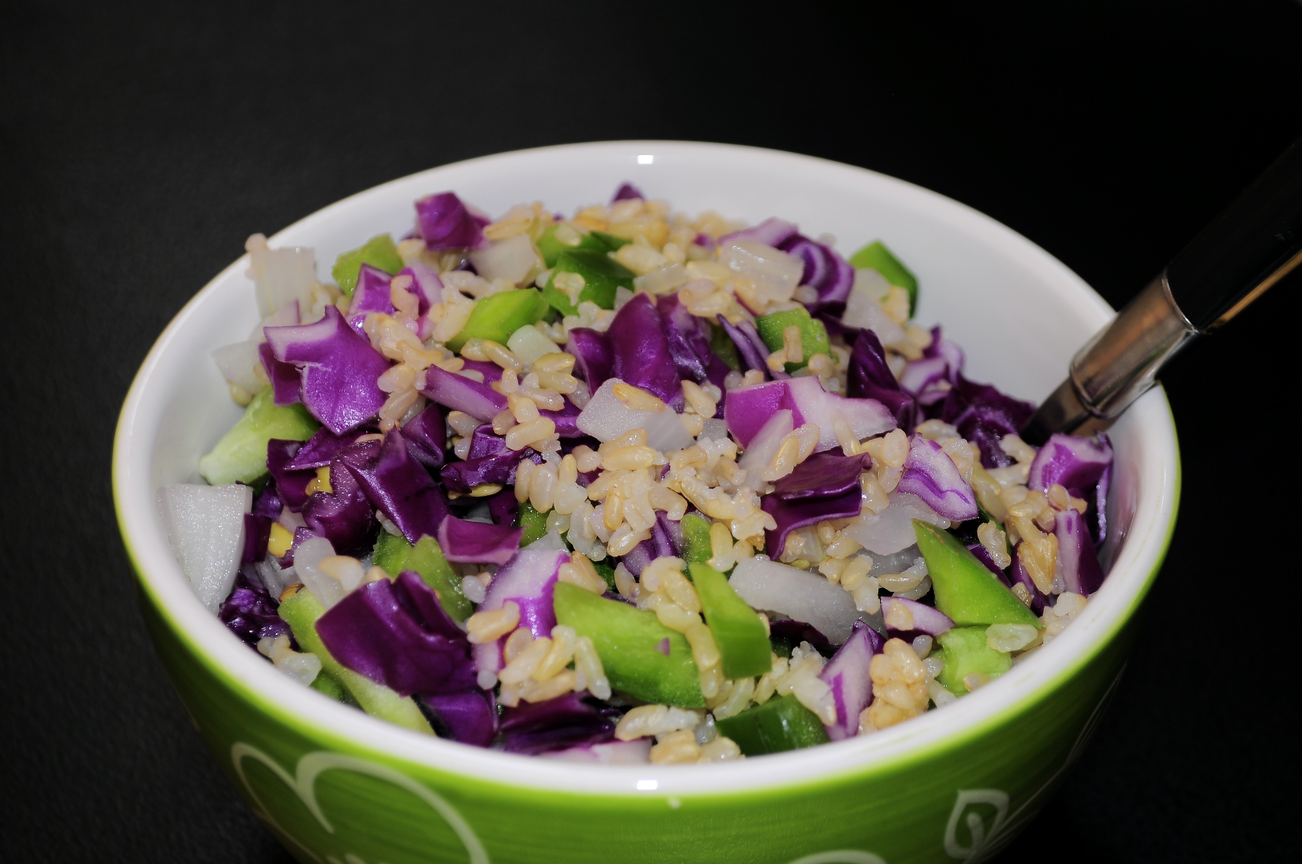 salad and green ceramic bowl