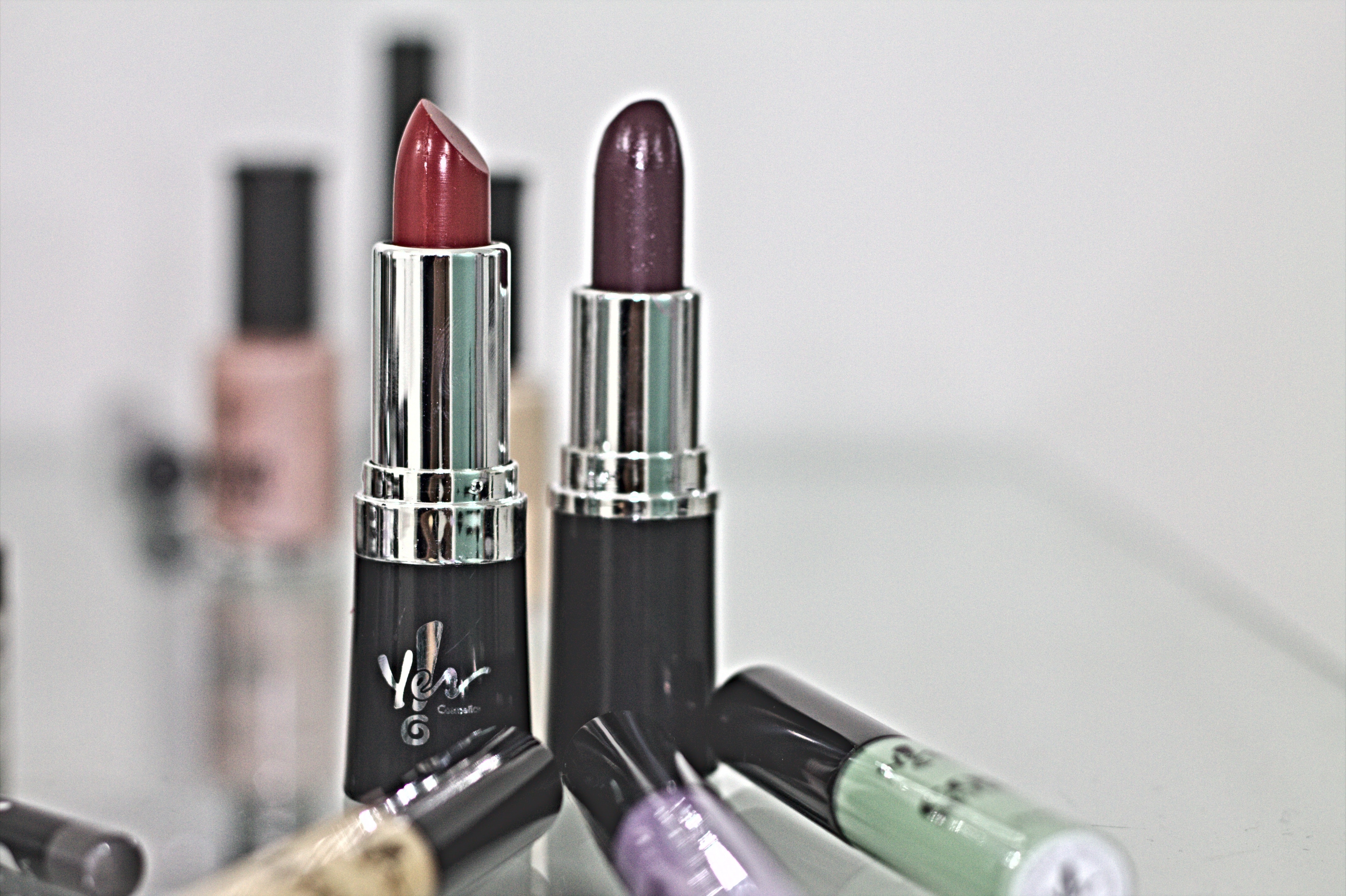 liquid and stick lipsticks shown
