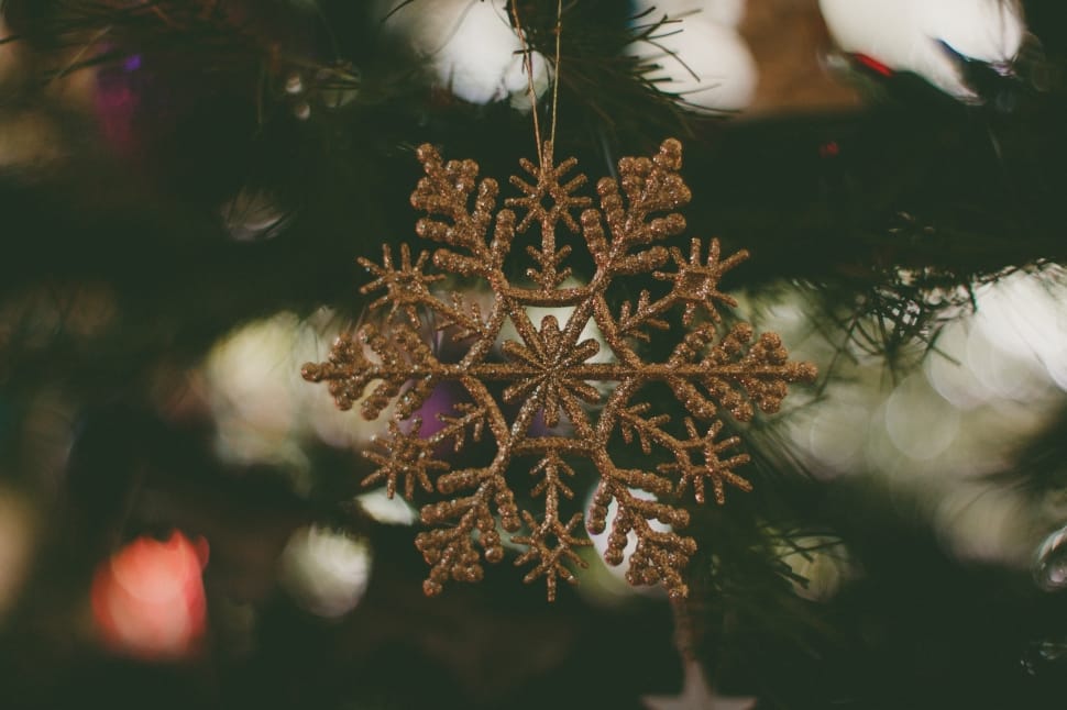 hanged silver snowflake christmas tree ornament close-up focus photo preview