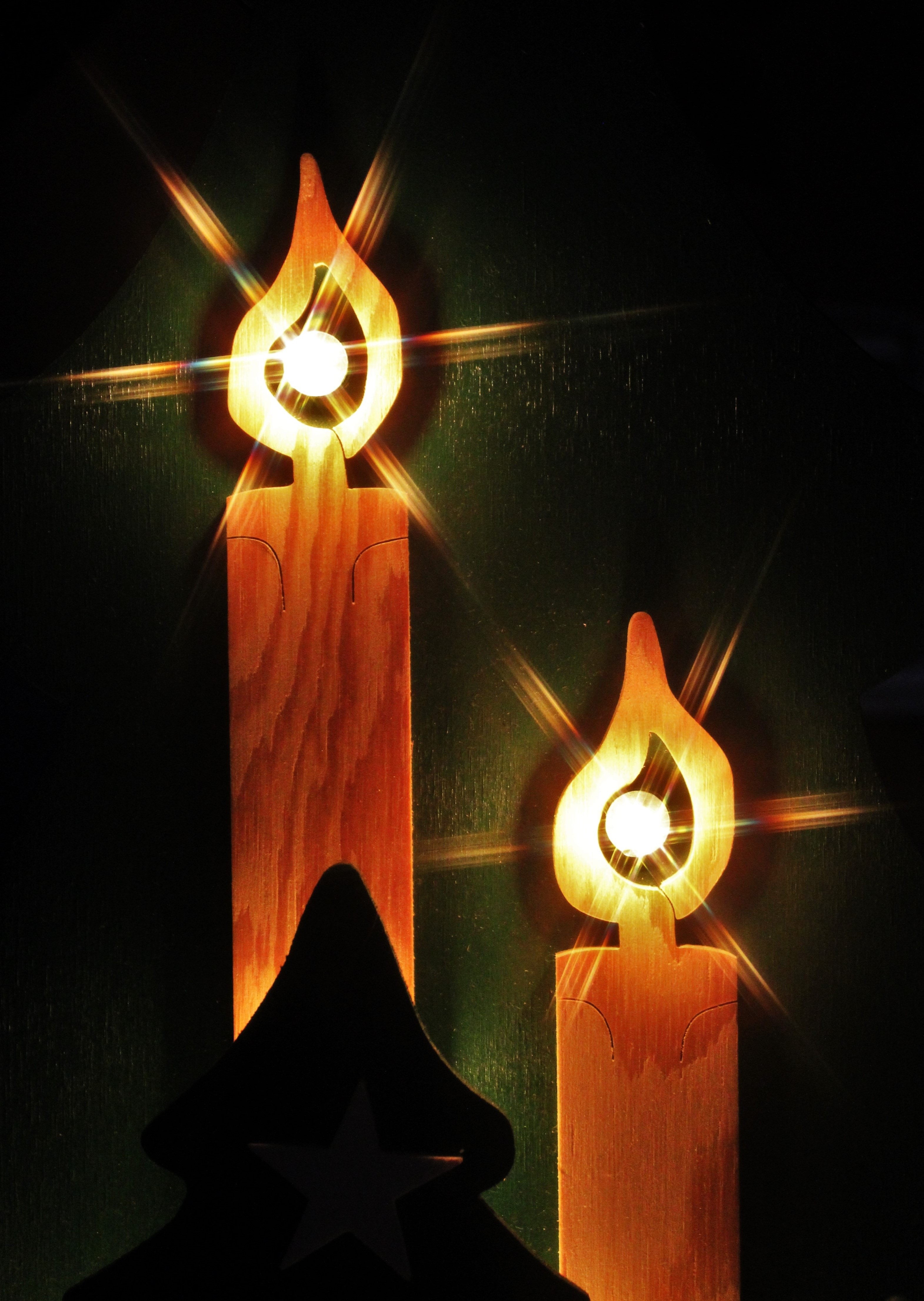two wooden light sconces