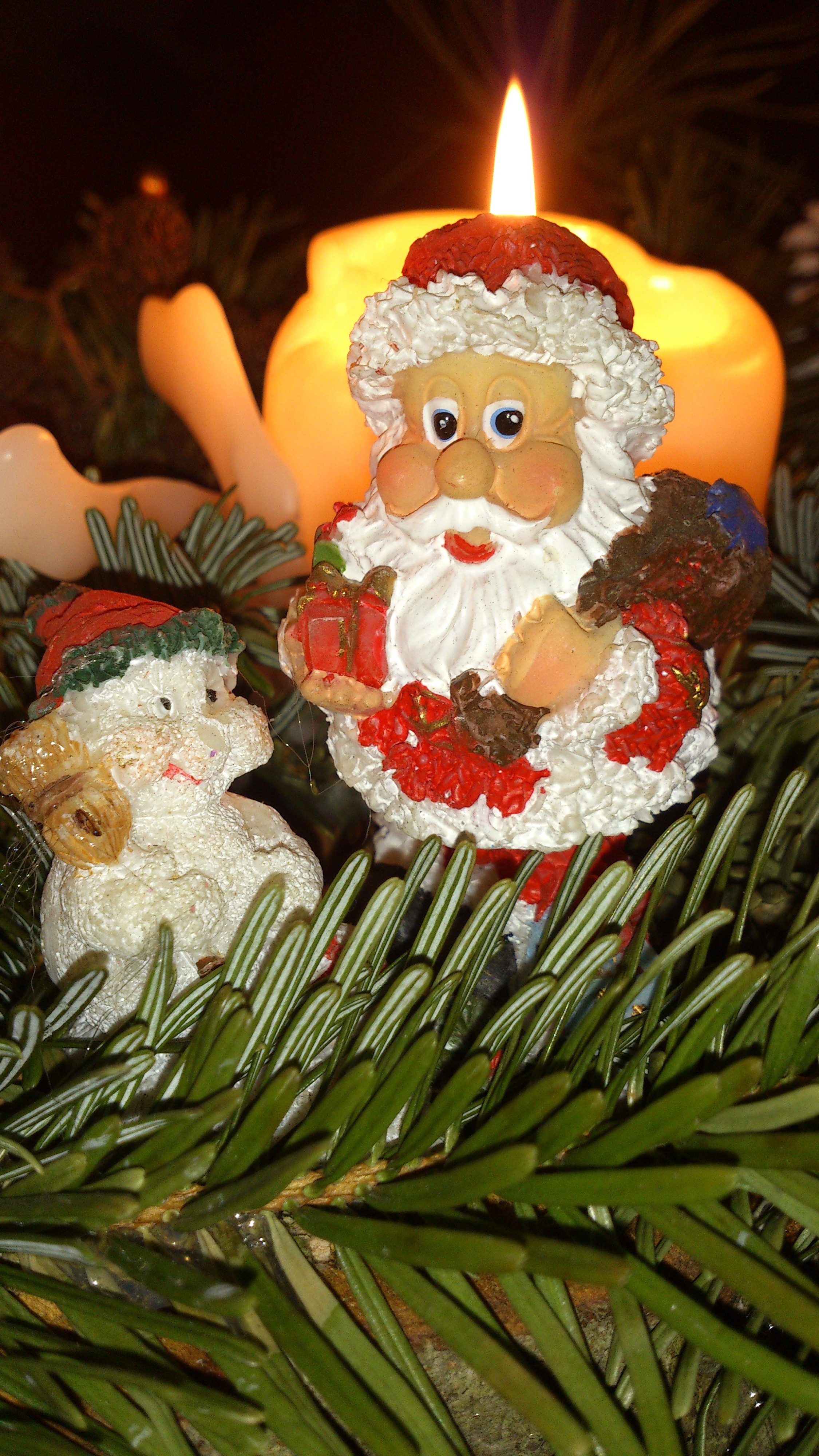 red brown and white santa claus ceramic figurine