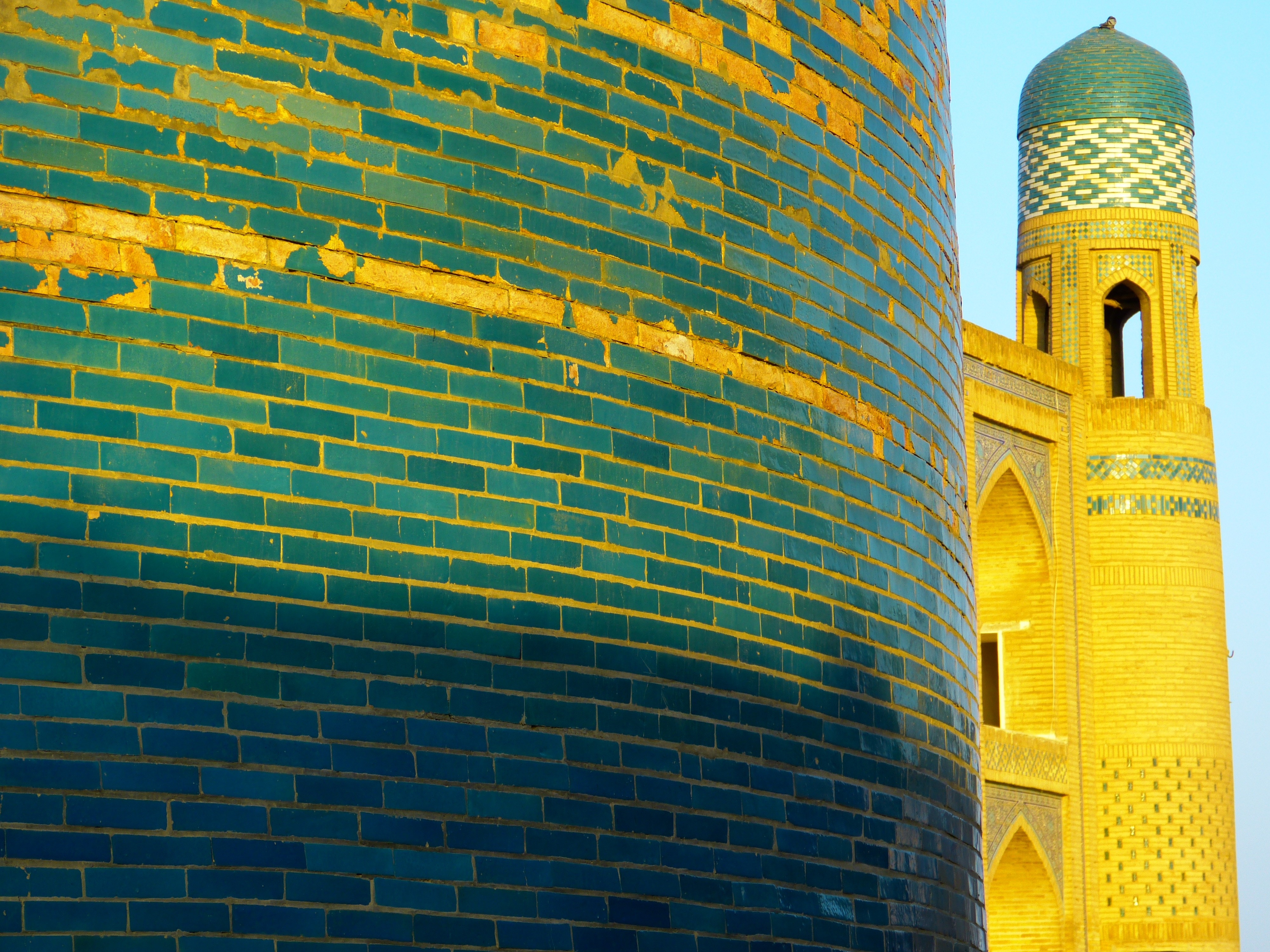 green and golden bricked mosque